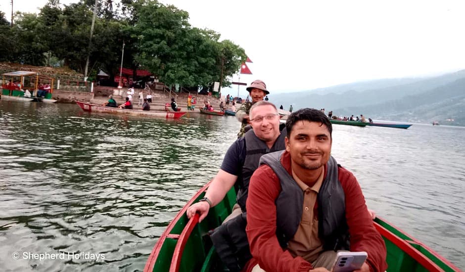 Riding a Boat in Fewa Lake