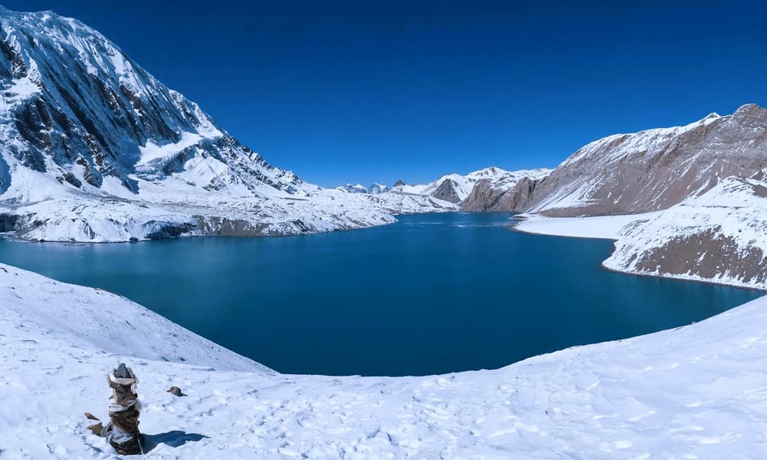 cinematic view of Tilicho Lake around mountains